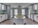 Spacious primary bath features a large soaking tub, shower, and custom cabinetry with dual vanities at 5964 N Pr Wind Drift Ln, Shelbyville, IN 46176