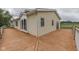 Close-up view of the home's deck area with horizontal wood railing at 5964 N Pr Wind Drift Ln, Shelbyville, IN 46176