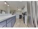 Updated kitchen features stainless appliances, modern backsplash, and beautiful countertop and floors at 5964 N Pr Wind Drift Ln, Shelbyville, IN 46176