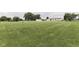 Spacious lot with well-maintained lawn, home, and detached garage at 5964 N Pr Wind Drift Ln, Shelbyville, IN 46176
