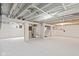 Unfinished basement with painted walls and ceilings perfect for storage or finishing to your liking at 6029 English Ave, Indianapolis, IN 46219