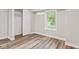 Bedroom featuring a closet and window at 6029 English Ave, Indianapolis, IN 46219