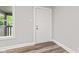 Bright entryway with view of front porch from inside the home at 6029 English Ave, Indianapolis, IN 46219