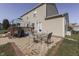 Backyard patio with seating and wooden deck at 6214 Weller Cir, Indianapolis, IN 46268