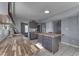 Spacious kitchen with ample counter space, a breakfast bar, and modern appliances at 6214 Weller Cir, Indianapolis, IN 46268