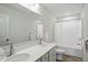 Bathroom featuring dual sinks, a large mirror, and a shower-tub combination at 633 Cowley Dr, Westfield, IN 46074