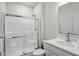 Clean bathroom featuring a shower with glass door, white vanity, and a large mirror at 633 Cowley Dr, Westfield, IN 46074