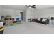 Spacious living room featuring neutral decor, soft carpet, and a comfortable sofa at 633 Cowley Dr, Westfield, IN 46074