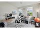 Bright office space with white walls, carpeted floors, and large windows at 633 Cowley Dr, Westfield, IN 46074