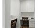 Bright office space with two workstations, white walls and natural light at 633 Cowley Dr, Westfield, IN 46074