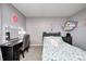Bedroom with a bed, vanity with lighted mirror, and plush toys for decoration and character at 6332 Card Blvd, Indianapolis, IN 46221