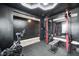 Gym featuring varied workout machines, modern lighting fixture and access to carpeted room at 6332 Card Blvd, Indianapolis, IN 46221