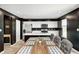 Bright kitchen with white cabinets, stainless steel appliances, and a functional island at 6332 Card Blvd, Indianapolis, IN 46221