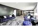 Stylish living room featuring an open floor plan with dark walls and light flooring at 6332 Card Blvd, Indianapolis, IN 46221