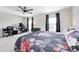 Spacious bedroom with ceiling fan, providing a comfortable and functional living space at 6332 Card Blvd, Indianapolis, IN 46221