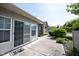 Concrete patio featuring a side of house with door and sliding glass door at 6586 Quail Run, Fishers, IN 46038