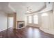 Comfortable living area featuring a fireplace and plenty of natural light at 6586 Quail Run, Fishers, IN 46038