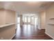 Bright living area featuring stylish floors, and an inviting fireplace at 6586 Quail Run, Fishers, IN 46038