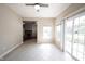 Sun room with tiled floor and sliding glass door access to outdoor area at 6586 Quail Run, Fishers, IN 46038