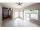 Sun room featuring tiled floor and access to an outdoor patio through sliding glass door at 6586 Quail Run, Fishers, IN 46038