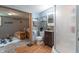 Bathroom featuring a single vanity, tiled backsplash, a toilet, and walk-in shower at 6805 Jackson St, Indianapolis, IN 46241
