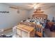 Comfortable bedroom featuring carpet, ceiling fan and decor at 6805 Jackson St, Indianapolis, IN 46241