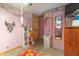 Cozy bedroom featuring a closet, carpet flooring and decor at 6805 Jackson St, Indianapolis, IN 46241