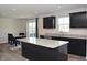 Modern kitchen with granite countertops, stainless steel appliances, and a center island with breakfast bar at 7153 Sultans Run Ln, Whitestown, IN 46075