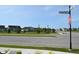 Street view of a Sultans Run Ln intersection showcasing well-maintained homes and landscaping at 7153 Sultans Run Ln, Whitestown, IN 46075