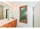 This bathroom features a wood frame window and vanity at 7175 Scarlet Oak Dr, Noblesville, IN 46062