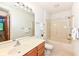 Bathroom featuring vanity, mirror, and a shower-tub combination with tiled floors at 7175 Scarlet Oak Dr, Noblesville, IN 46062