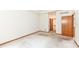 Bedroom with neutral carpet, and view into bathroom at 7175 Scarlet Oak Dr, Noblesville, IN 46062