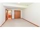 Carpeted bedroom featuring a closet and an open doorway into the bathroom at 7175 Scarlet Oak Dr, Noblesville, IN 46062
