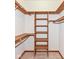 Walk-in closet with shelving, racks, and neutral carpet at 7175 Scarlet Oak Dr, Noblesville, IN 46062