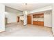 Open dining area featuring a chandelier, built-in cabinetry, and stairway at 7175 Scarlet Oak Dr, Noblesville, IN 46062