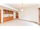 Bright dining area with a decorative chandelier and built-in cabinetry at 7175 Scarlet Oak Dr, Noblesville, IN 46062