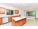 Spacious eat in kitchen with view to deck, oak cabinets and center island at 7175 Scarlet Oak Dr, Noblesville, IN 46062