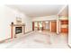 Spacious living room with fireplace and bright natural light throughout the home at 7175 Scarlet Oak Dr, Noblesville, IN 46062
