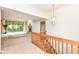 Spacious living area with fireplace, large windows, and balcony access at 7175 Scarlet Oak Dr, Noblesville, IN 46062
