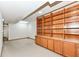 This is a living room with built in wood cabinets and shelving at 7175 Scarlet Oak Dr, Noblesville, IN 46062