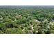 Beautiful neighborhood with large mature trees and lush landscaping provides excellent curb appeal at 7629 Candlewood Ln, Indianapolis, IN 46250
