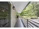 Relaxing balcony area with sleek railing and outdoor decor at 7629 Candlewood Ln, Indianapolis, IN 46250