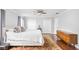 Spacious main bedroom with hardwood floors, ceiling fan, and a large closet at 7629 Candlewood Ln, Indianapolis, IN 46250