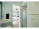 Bright bathroom with tiled floors features a glass-enclosed shower with access to a bedroom at 7736 Wawasee Dr, Indianapolis, IN 46250