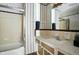 Bathroom featuring a tub/shower combo and a vanity with a sink and countertop at 7736 Wawasee Dr, Indianapolis, IN 46250