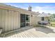 An inviting wooden deck with an outdoor dining set, ideal for entertaining or enjoying a meal outdoors at 792 Nevelle Ln, Carmel, IN 46032