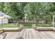 Wooden deck with outdoor seating overlooking a grassy lawn at 792 Nevelle Ln, Carmel, IN 46032