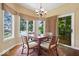Cozy eating area with large windows offering a view of the outdoors at 817 Hickory Way, Noblesville, IN 46062
