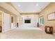 Spacious living room offers built-in shelving, a cozy atmosphere, and a large window for ample natural light at 817 Hickory Way, Noblesville, IN 46062
