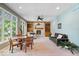 Spacious living room with large windows, fireplace, built-in shelving and comfortable seating at 817 Hickory Way, Noblesville, IN 46062